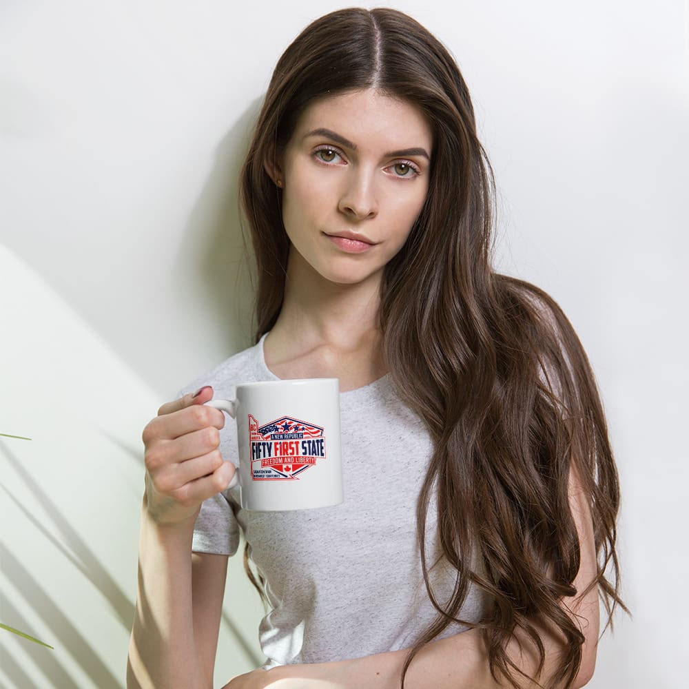 A woman holding a mug in her hand.