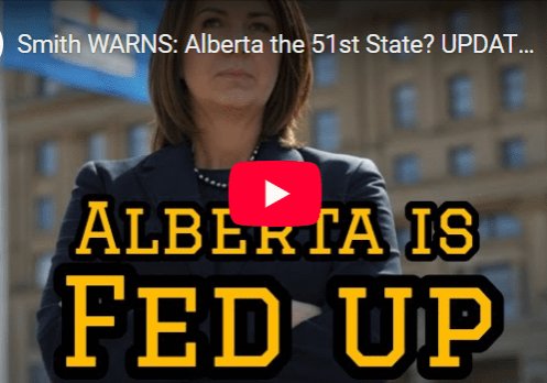 A woman standing in front of a building with the words " alberta is fed up ".